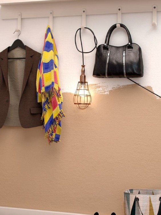 Ściana w przedpokoju pomalowana odcieniami Beckers.