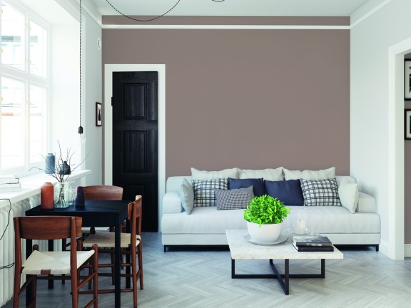 Ściana w salonie pomalowana odcieniami Chocolate Pudding z kolekcji Beckers Väggfärg Colour oraz White z kolekcji Beckers Väggfärg Kitchen & Bathroom