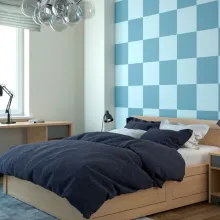 ściana w salonie pomalowana odcieniami Oyster i Harmony z kolekcji Beckers Väggfärg Colour